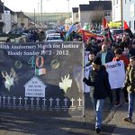 Photograph of marchers Leaving Creggan Shops at start of Bloody Sunday march for Justice 2014.