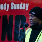 Photograph of Stafford Scott from Broadwater Farm estate in Tottenham, London, speaking at the end of the Bloody Sunday march for Justice 2014.